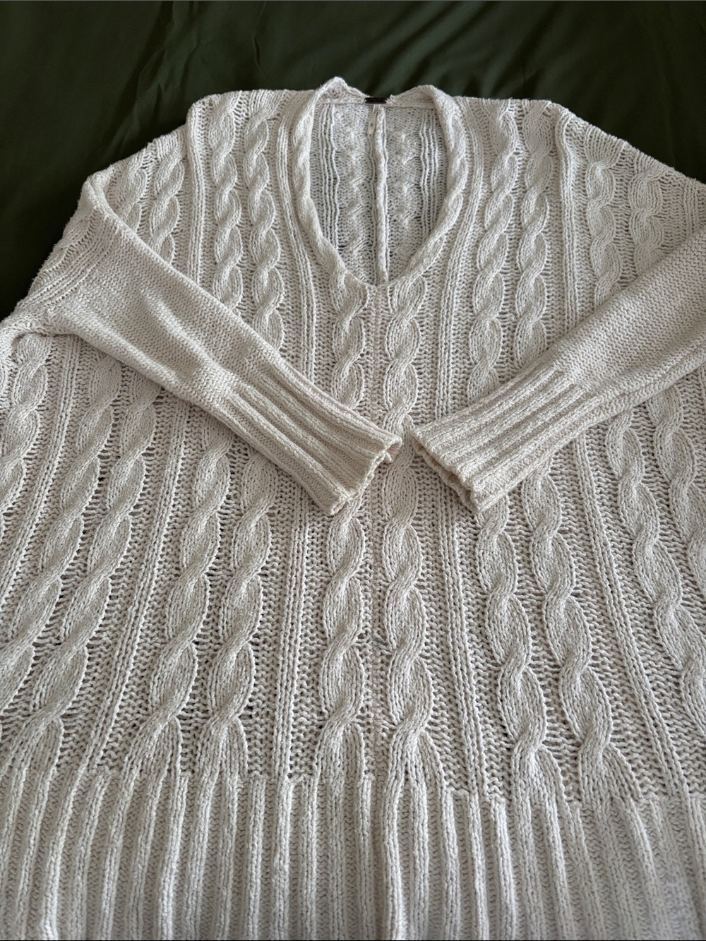 White cotton over sized cable knit V-Neck women’s sweater.